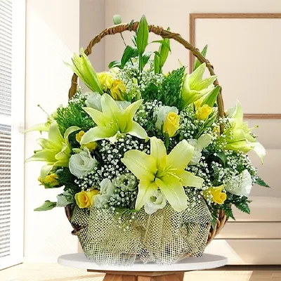 A basket of 5 white lilies and 20 yellow & white Roses with fillers
