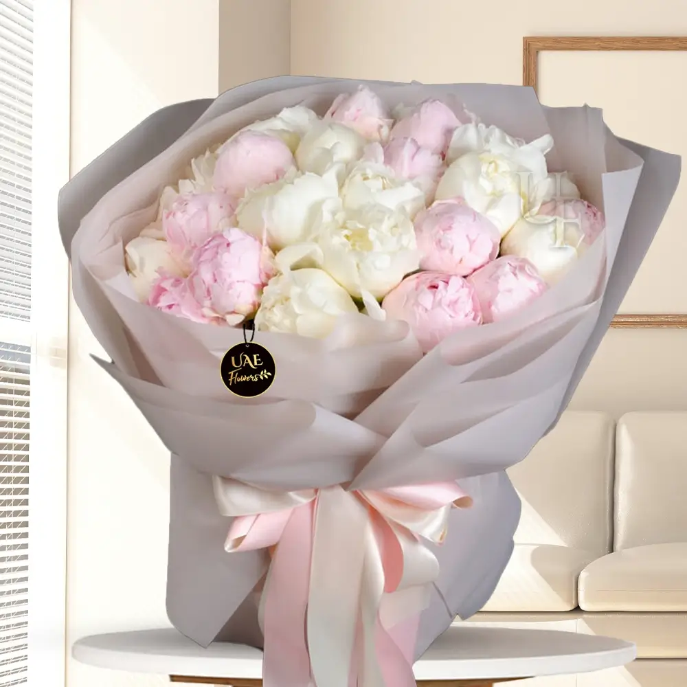 White and pink peonies bouquet in elegant wrapping, available in Classic, Deluxe, and Premium sizes for weddings and special occasions.