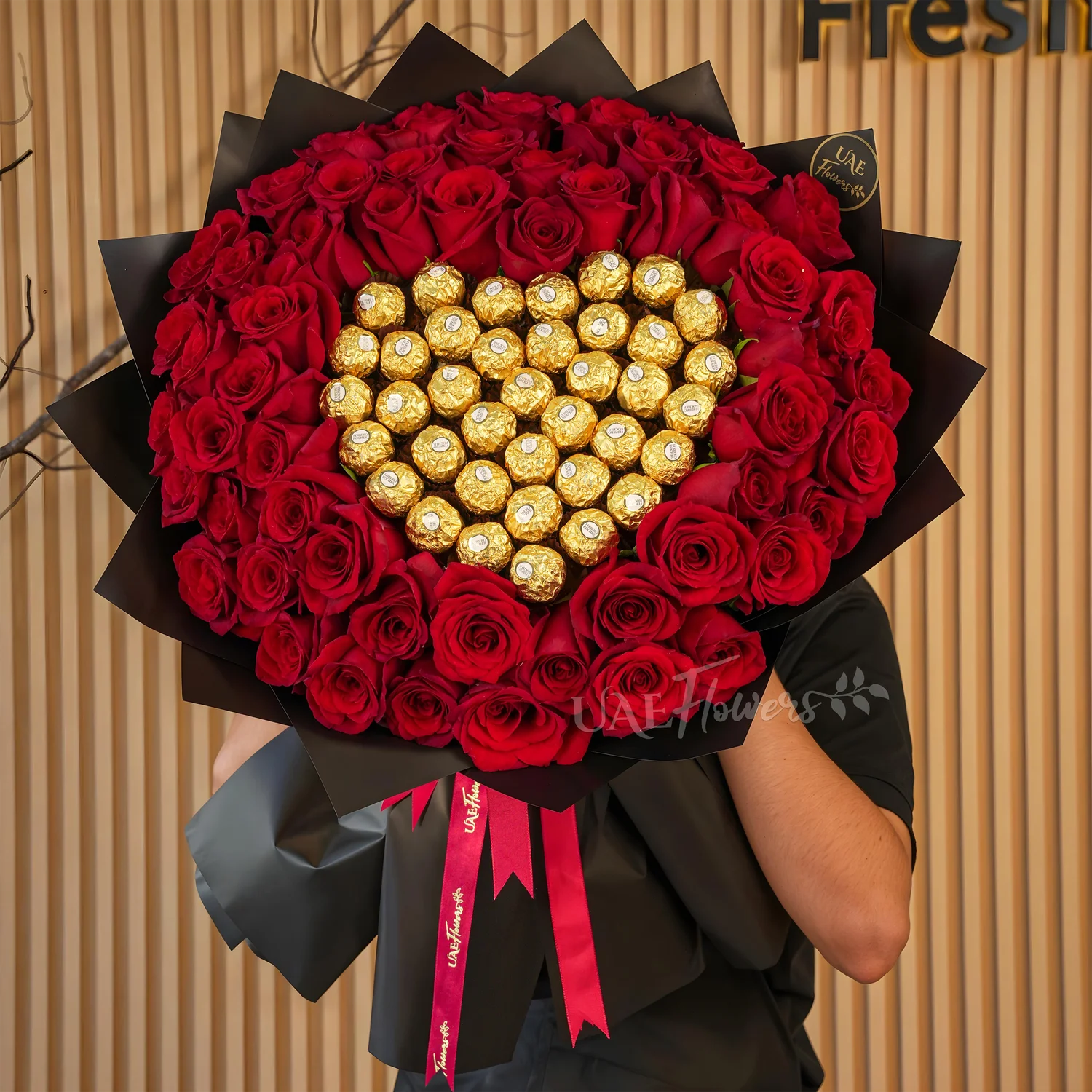 bouquet of 50 red roses with 32 Ferrero Rocher chocolates