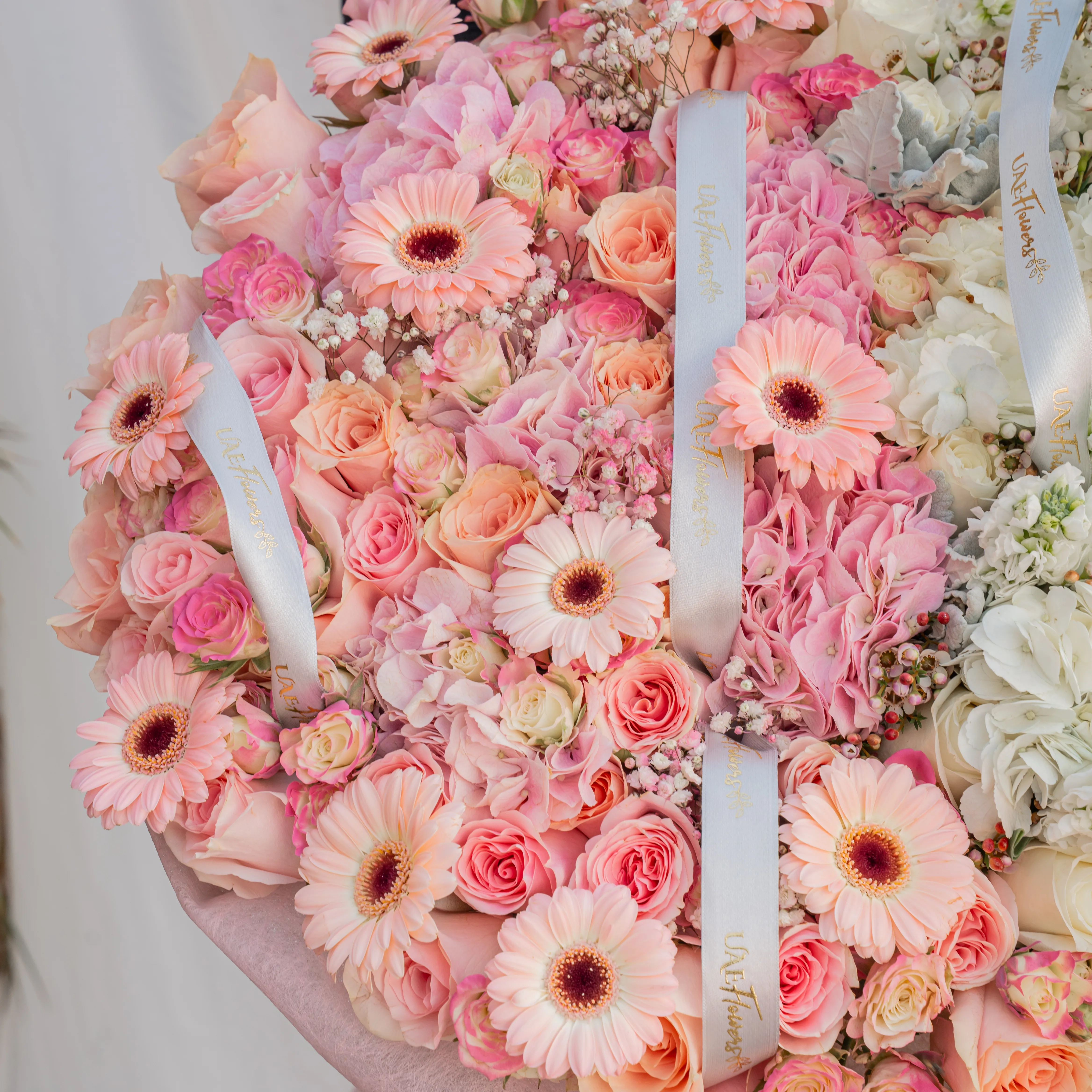 bouquet of pink hydrangeas, roses, gerberas, spray roses