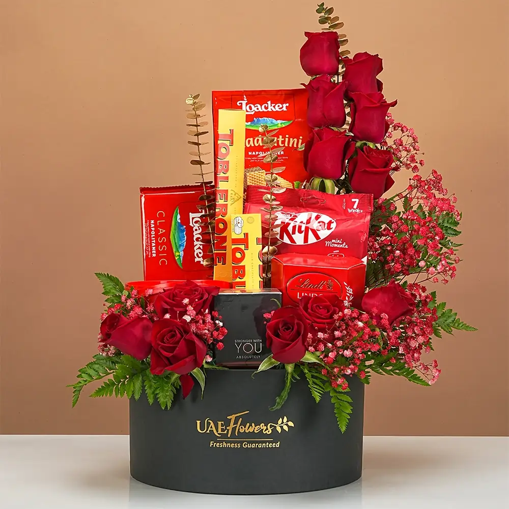 Gift box with 12 red roses, red baby’s breath, chocolates and Armani Stronger With You perfume