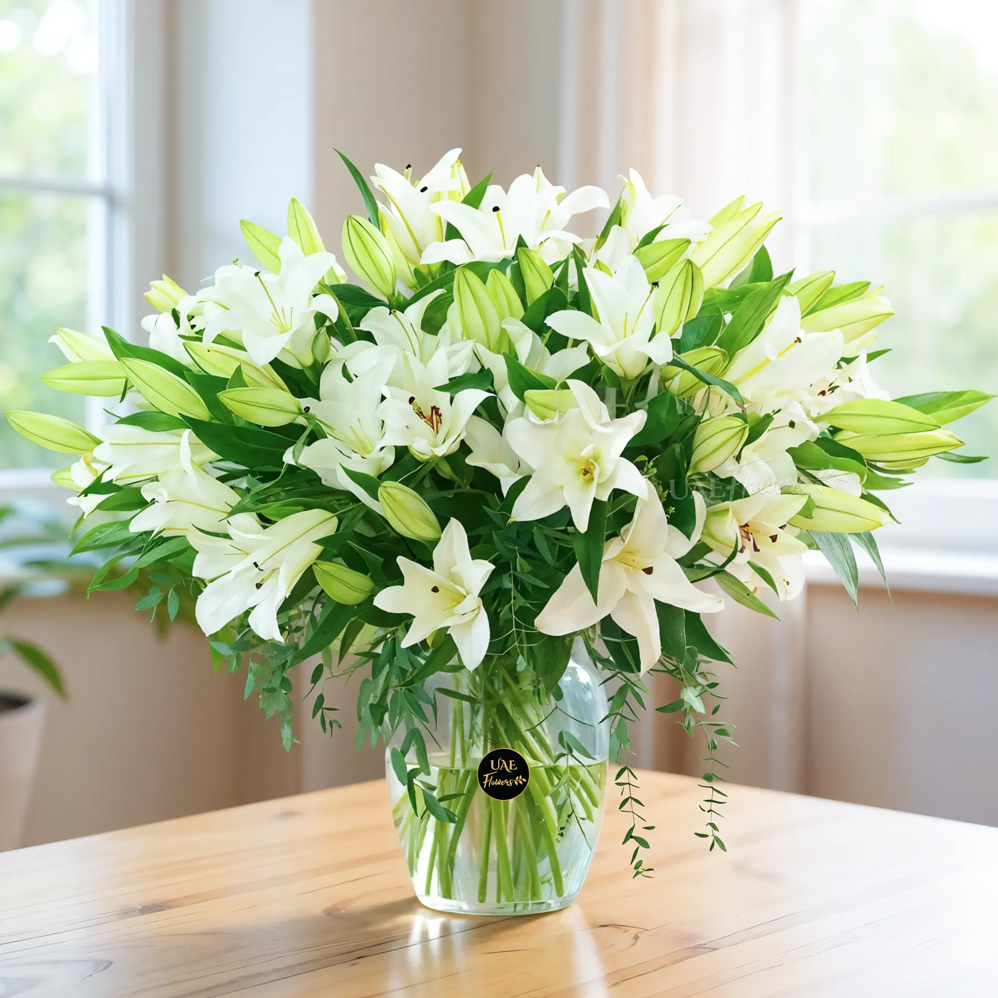 glass vase with 20 white lilies and green fillers
