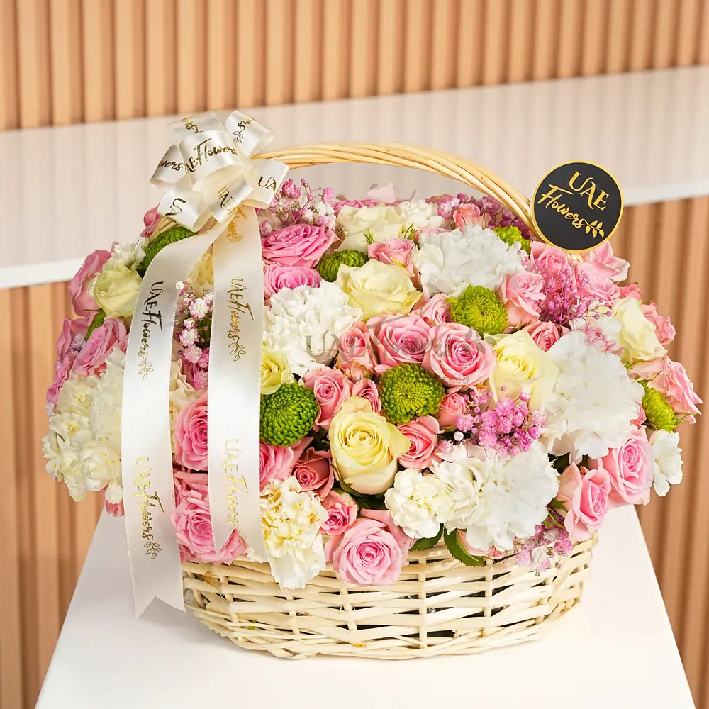 10 pink roses, 10 white roses, 10 white carnations, 5 pink spray roses