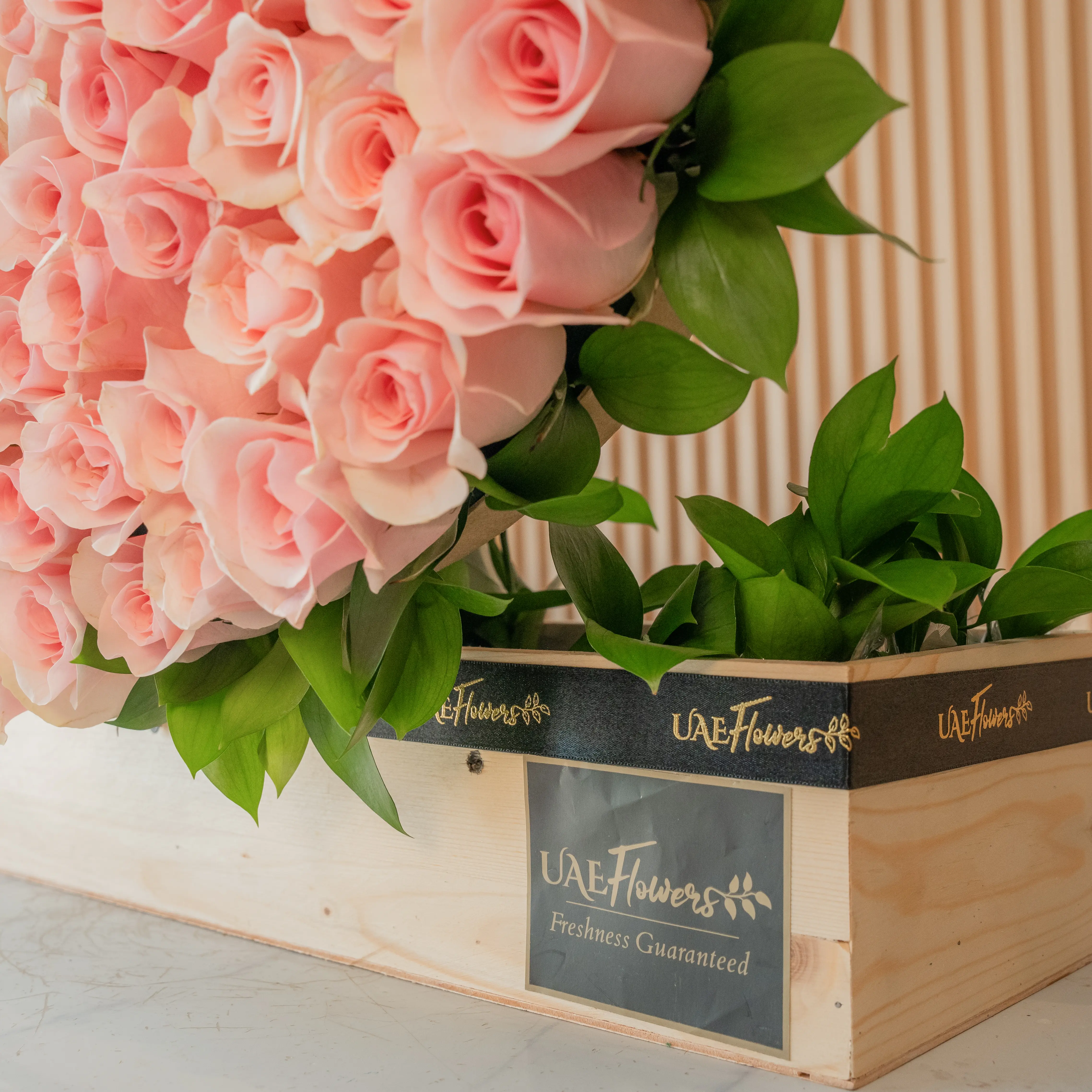 duo heart arrangement has 100 red roses and 50 pink roses