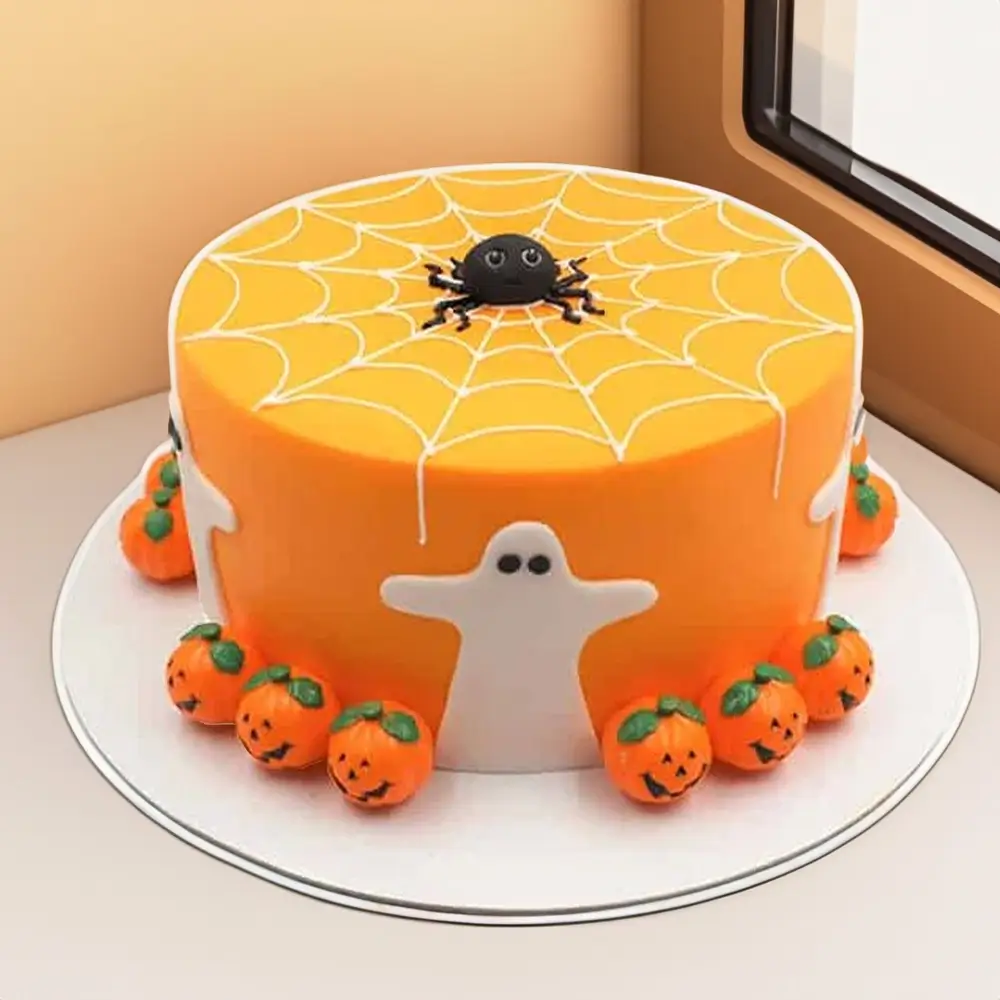 Orange Halloween-themed cake decorated with a spider web design, fondant ghosts, and pumpkin faces, perfect for spooky Halloween parties and celebrations. Orange Halloween-themed cake decorated with a spider web design, fondant ghosts, and pumpkin faces, perfect for spooky Halloween parties and celebrations.